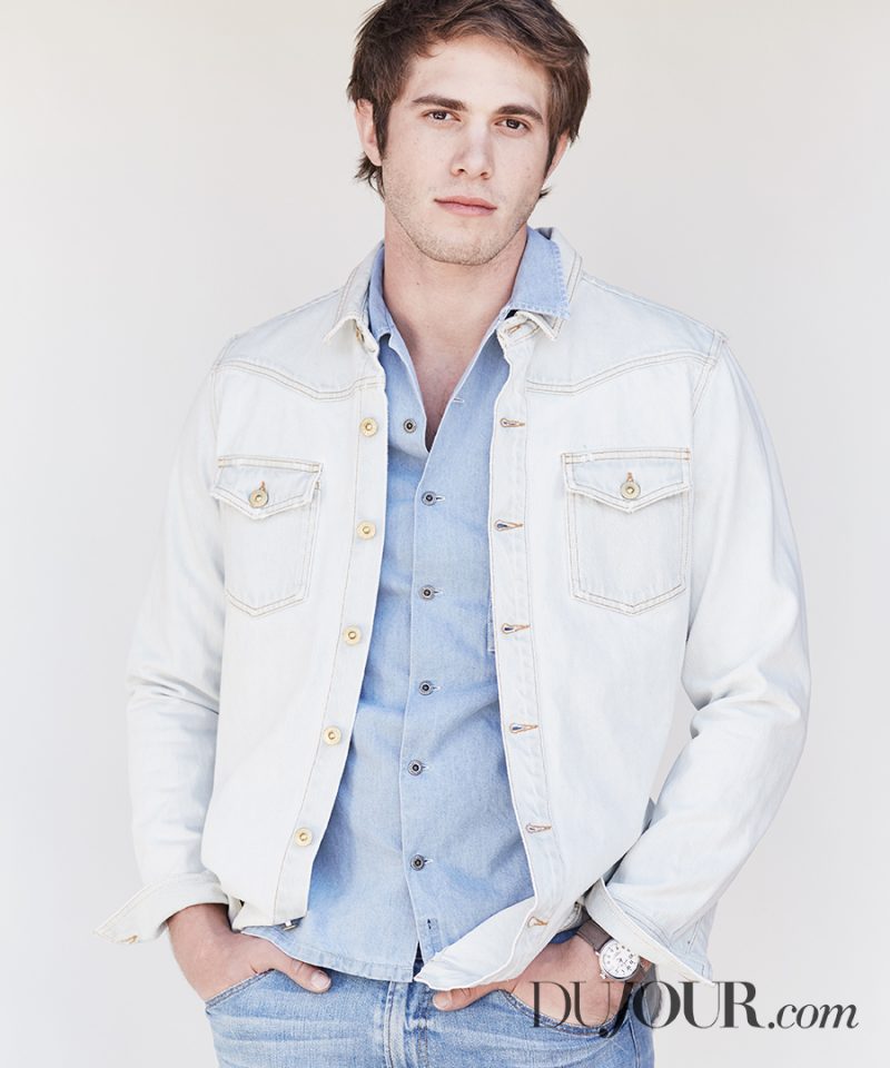 Blake Jenner doubles down on denim in an Off-White jacket, Nudie Jeans shirt and GUESS jeans.