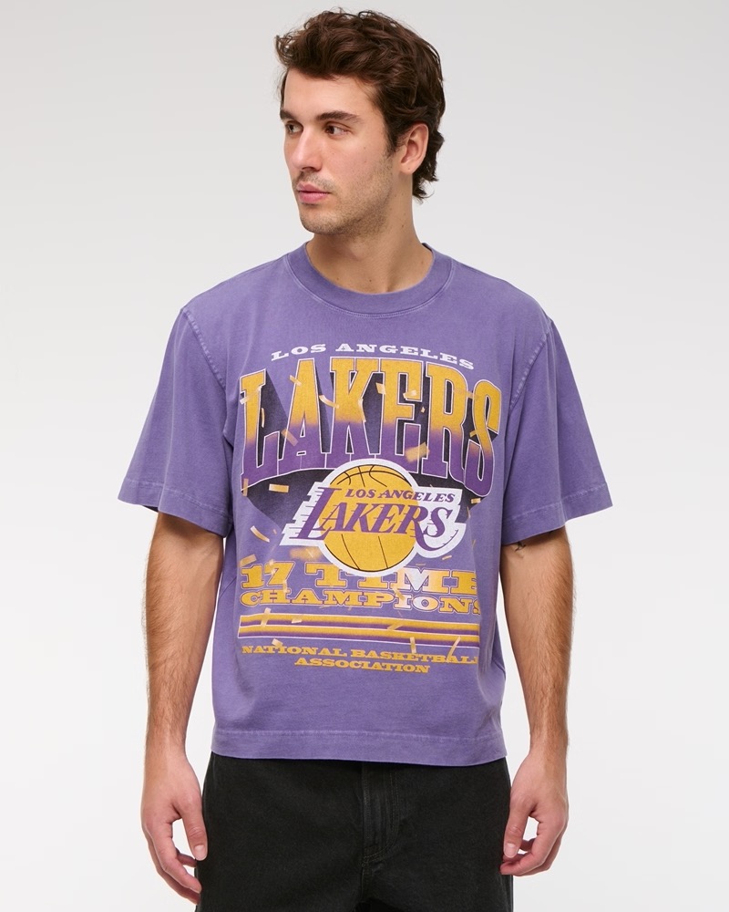 Abercrombie & Fitch's Lakers tee leans into throwback energy, turning the cropped graphic T-shirt into both a fan statement and a fashion move.