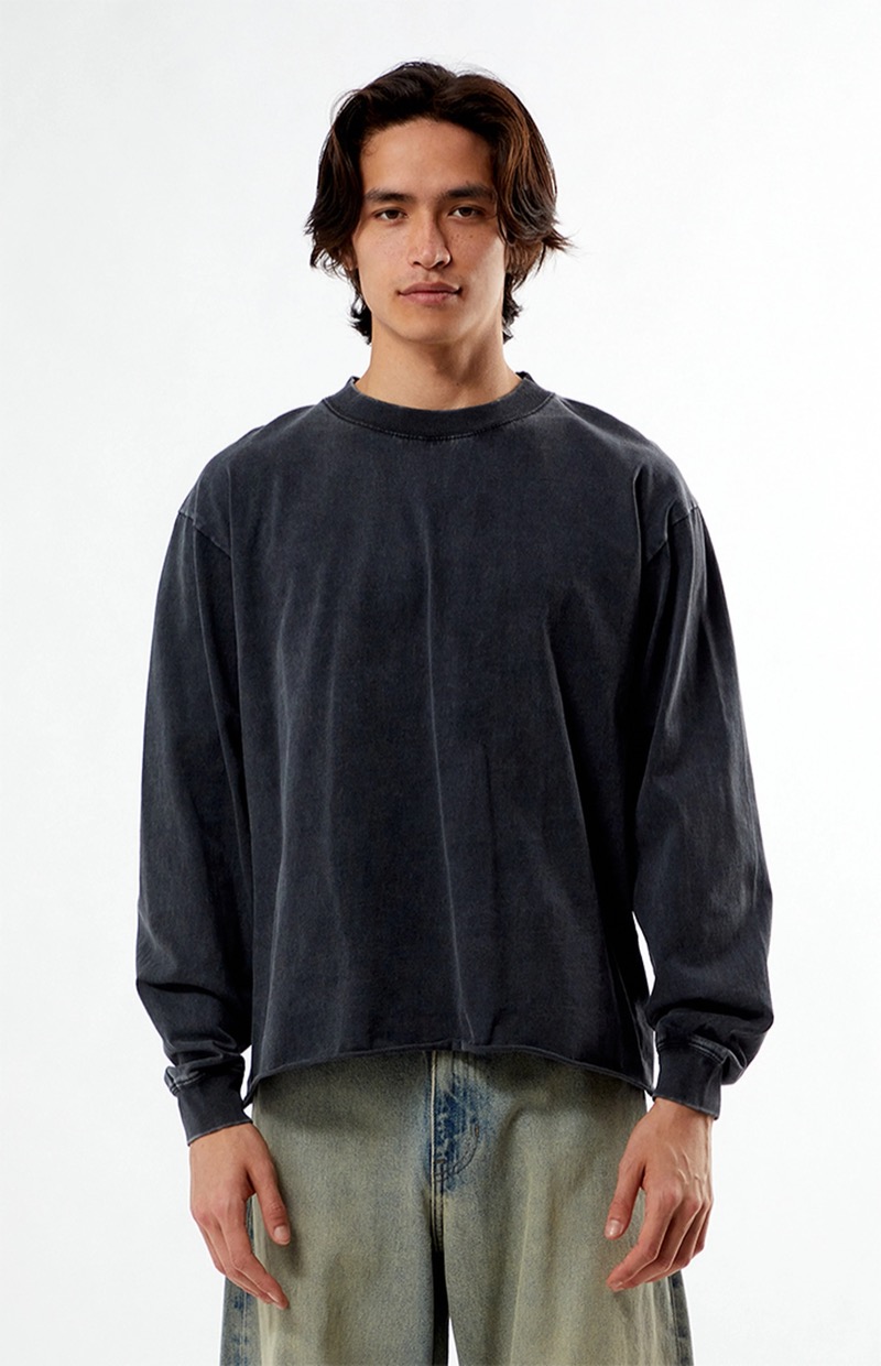 A long-sleeve cropped tee balances throwback energy with a modern, off-duty silhouette.