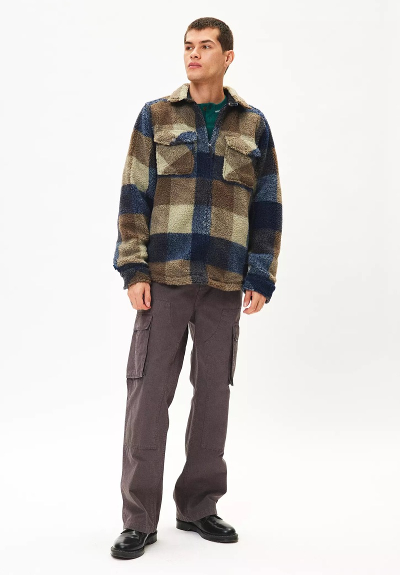 Plaid fleece and cargo pants deliver rugged warmth fit for storm-season layering. 