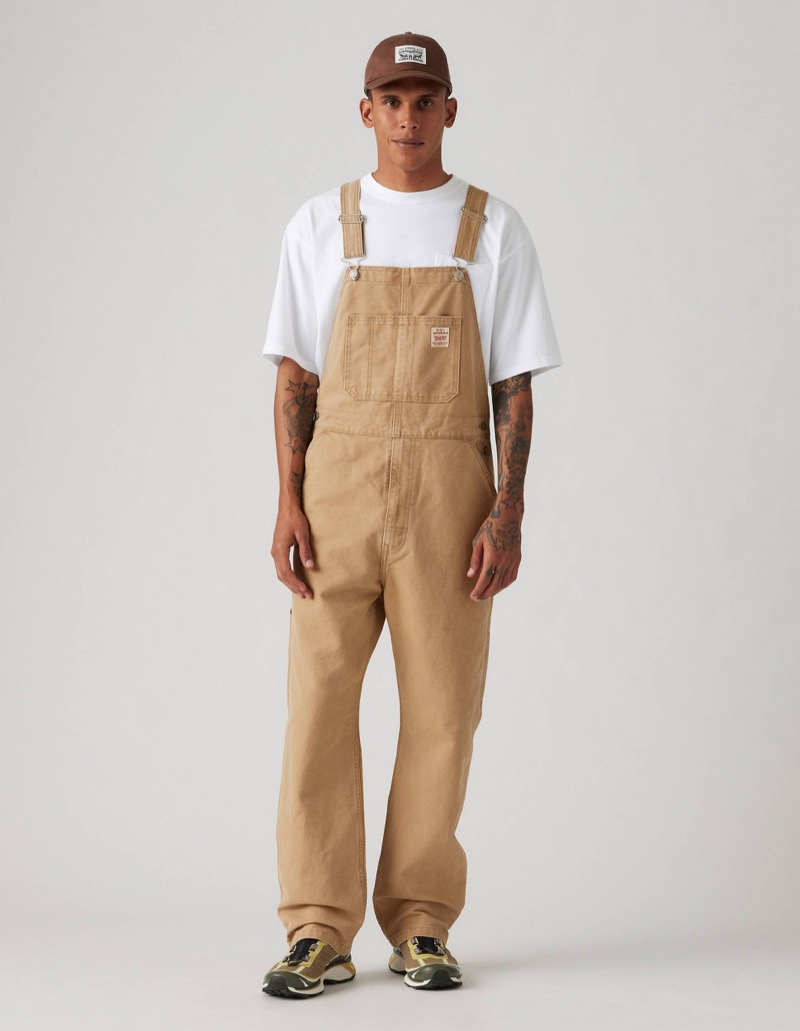 Utility overalls nod to dockside labor with stripped-down honesty.