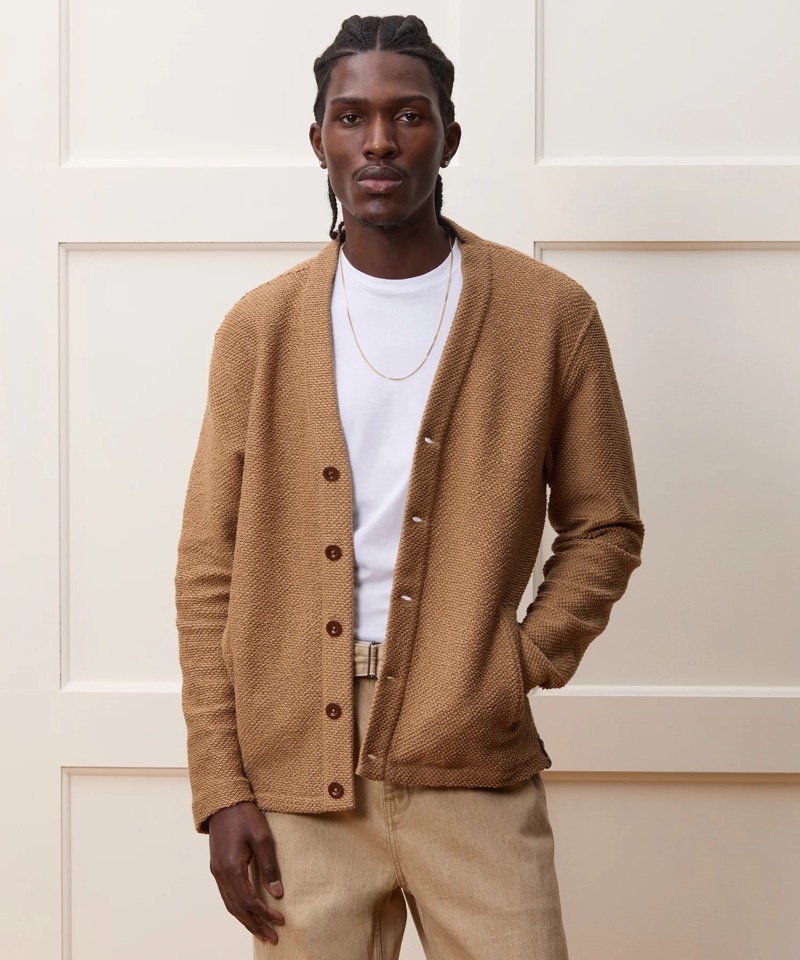 Achieve a smart look by wearing a cardigan over a T-shirt. 