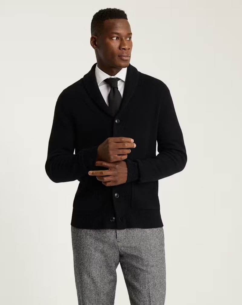 Add a formal quality to the shawl collar cardigan with a shirt and tie.