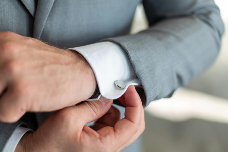 cufflink with grey suit