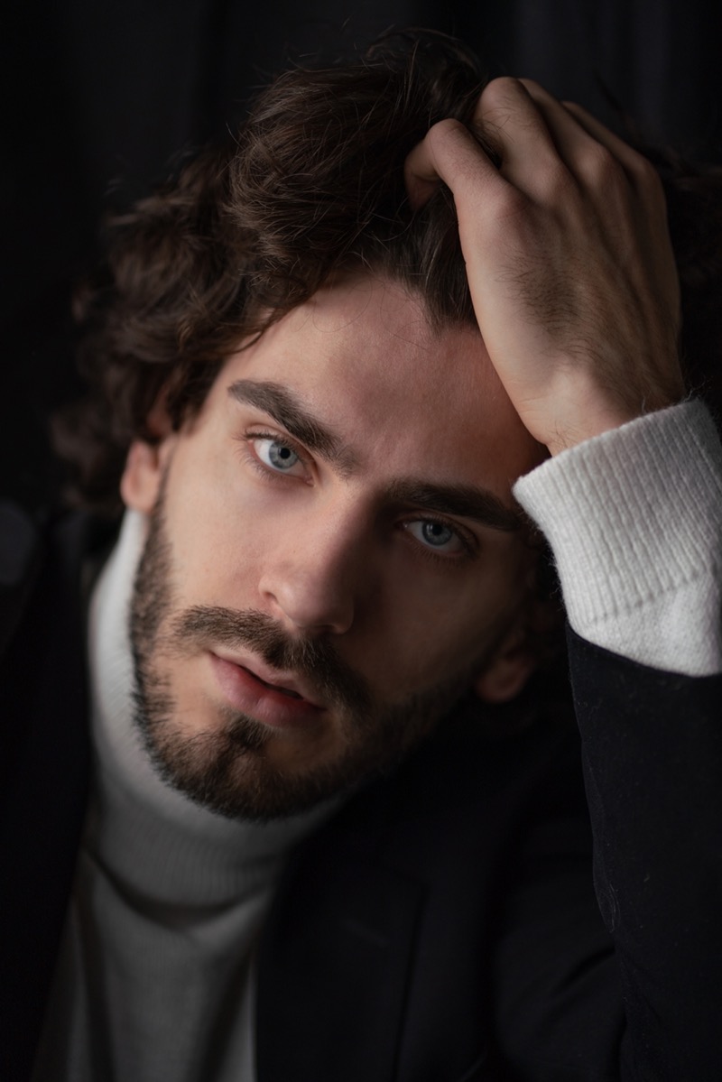 Hand in Hair Male Model Pose