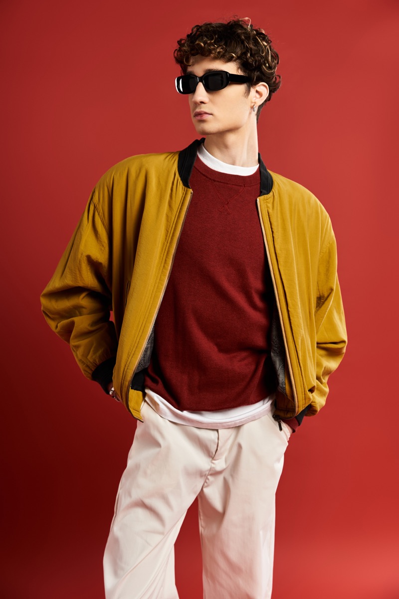 Hands in Pockets with Head Turn Male Model Pose