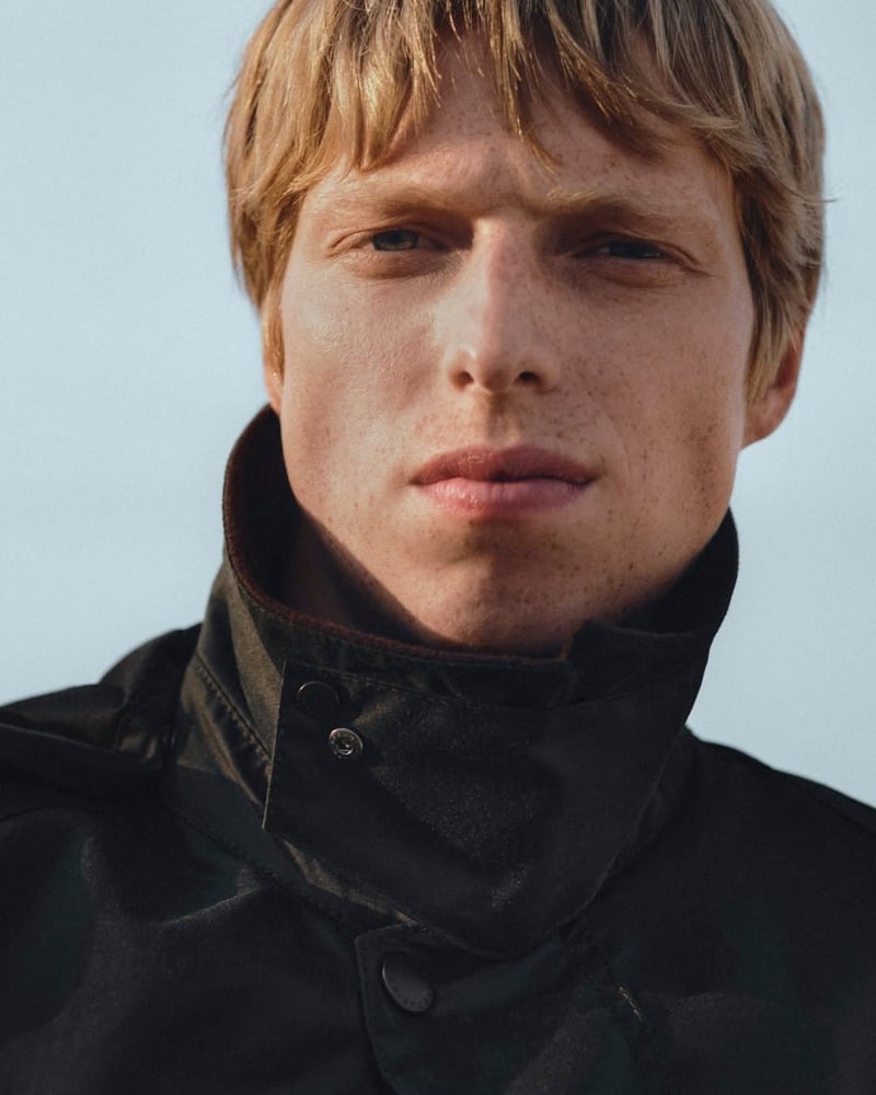 Joseph Uyttenhove with his waxed jacket collar fastened around his neck for Barbour x A.P.C.