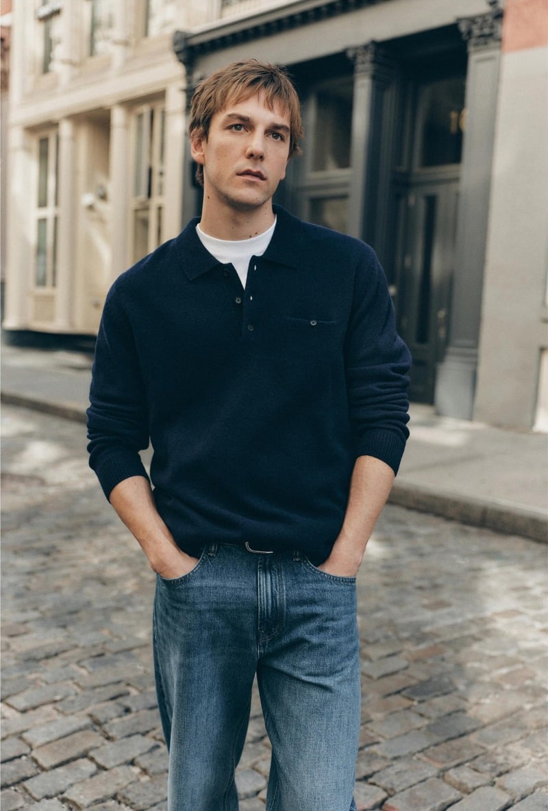 Quentin Demeester wears a navy long-sleeve polo over a white T-shirt with jeans for Massimo Dutti's fall 2026 New York edit.