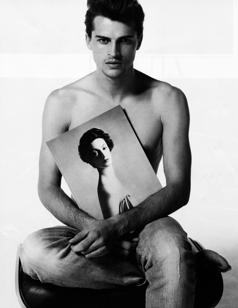 Sitting for a portrait, Romulo Pires appears in L'Officiel Hommes