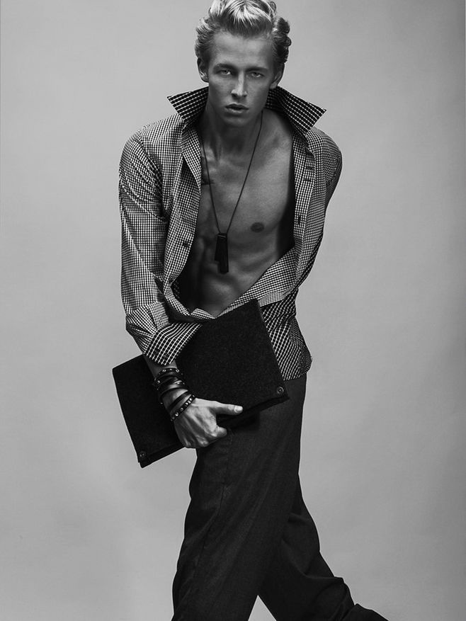 Sander wears shirt Kirill Safonov, trousers Kalle HT, chain Projekt, leather wristband Stella Soomlais and laptop case Portel.
