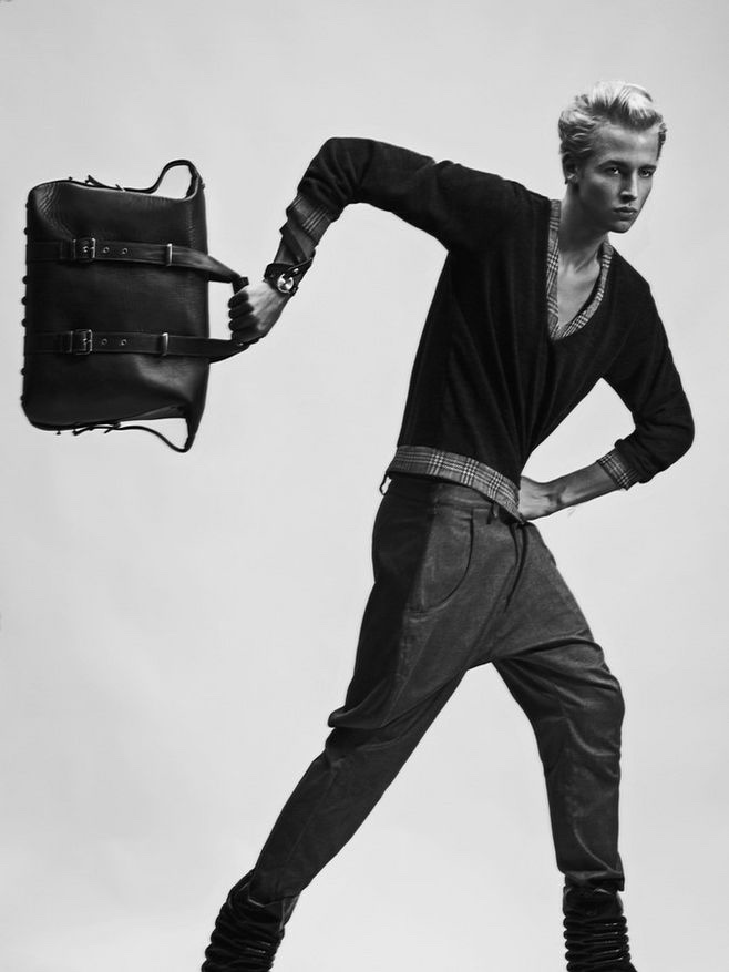 Sander wears pullover and trousers Kalle HT, leather watch and bag Stella Soomlais.