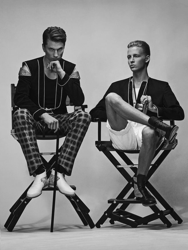 Kristjan wears jacket Hans Schwarz, trousers Kalle HT and shoes Scheckmann. Sander wears jacket and trousers Hans Schwarz and shoes Scheckmann.