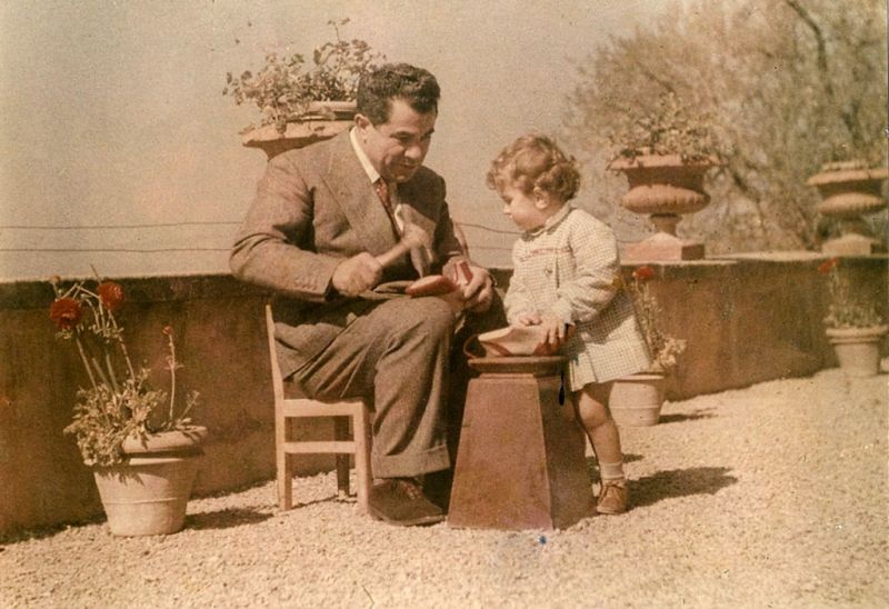 Salvatore Ferragamo with his son Leonardo at Palagio in 1956