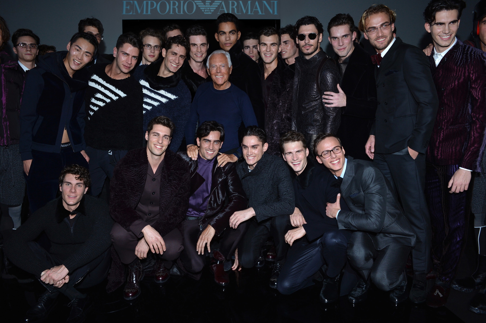 Giorgio Armani Poses with Models of Fall/Winter 2014 Shows