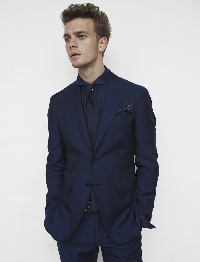 Benjamin Eidem Sports a Lifetime Supply of Suits for King Magazine