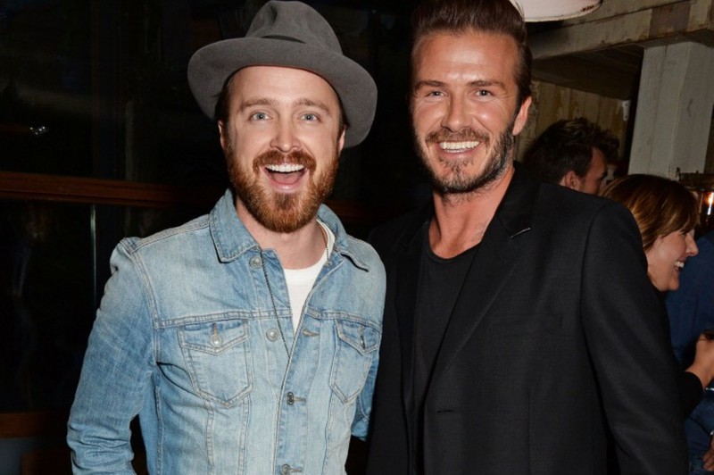 Actor Aaron Paul poses with David Beckham