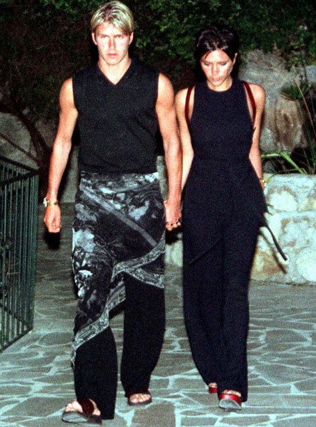 Captured on June 2, 1998, David Beckham caught attention, wearing a sarong as he and Victoria visited a restaurant in the south of France.