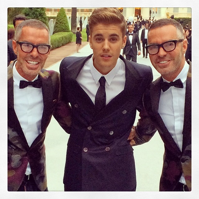 Dsquared2 designers Dan and Dean Caten pose with singer Justin Bieber at the amFAr Gala