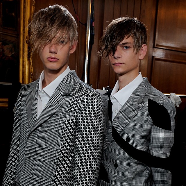 Models pose backstage at Alexander McQueen's London show.