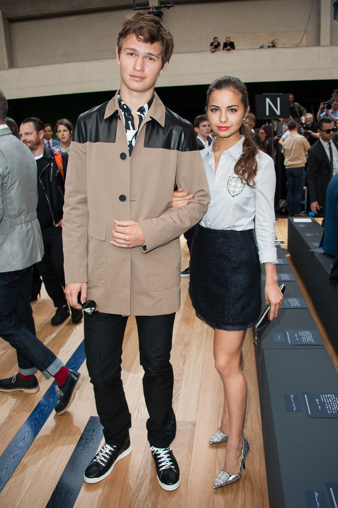 Ansel Elgort and his girlfriend Violetta Komyshan pose for a photo at Dior Homme's summer 2015 show.