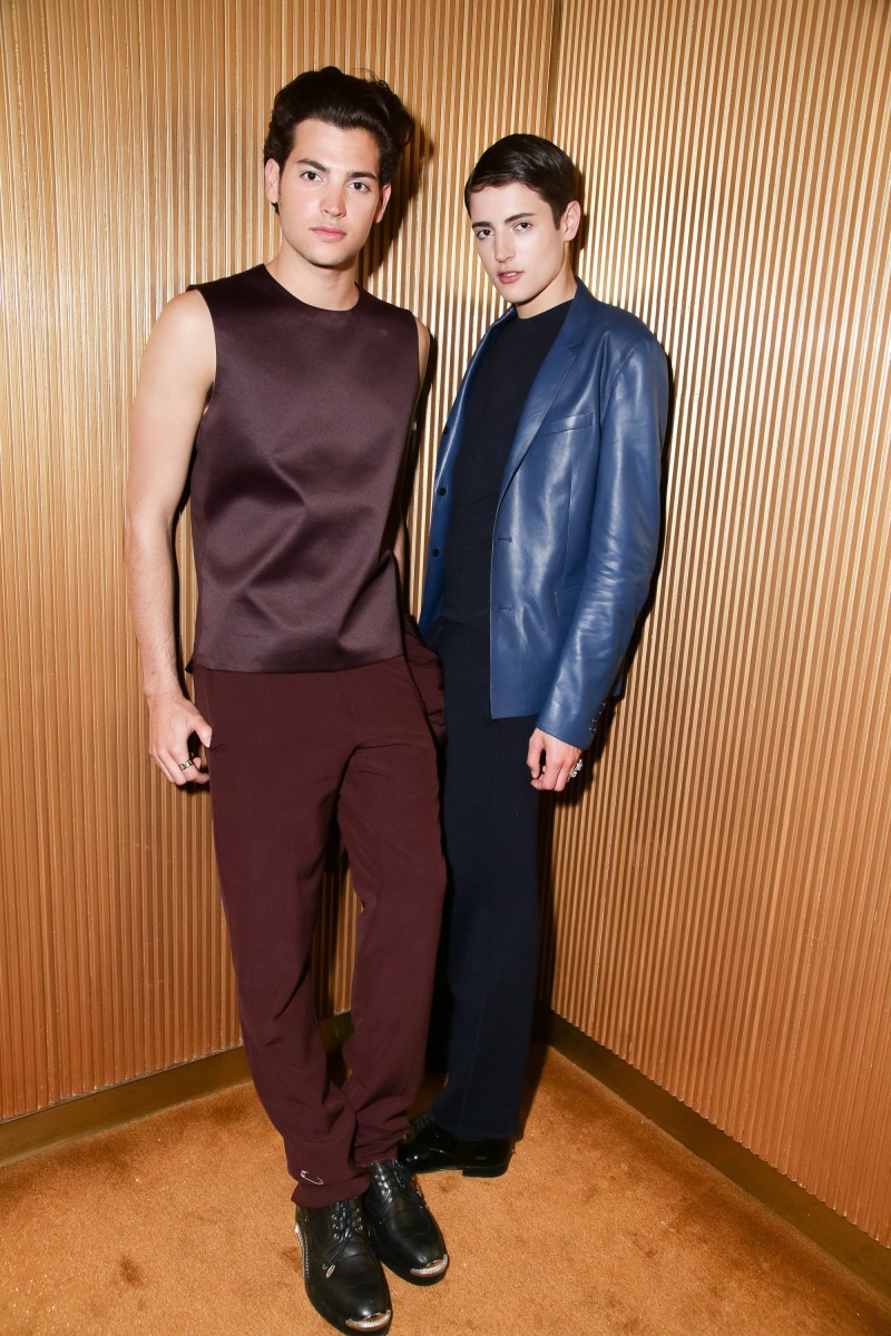 Harry Brant and Peter Brant Jr. pose for a photo, wearing looks from Dior Homme