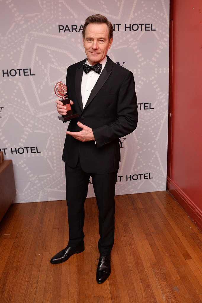 'Breaking Bad' actor Bryan Cranston, dressed by Calvin Klein Collection, poses with his Tony for Best Performance by an Actor in a Leading Role in a Play for 'All The Way'.