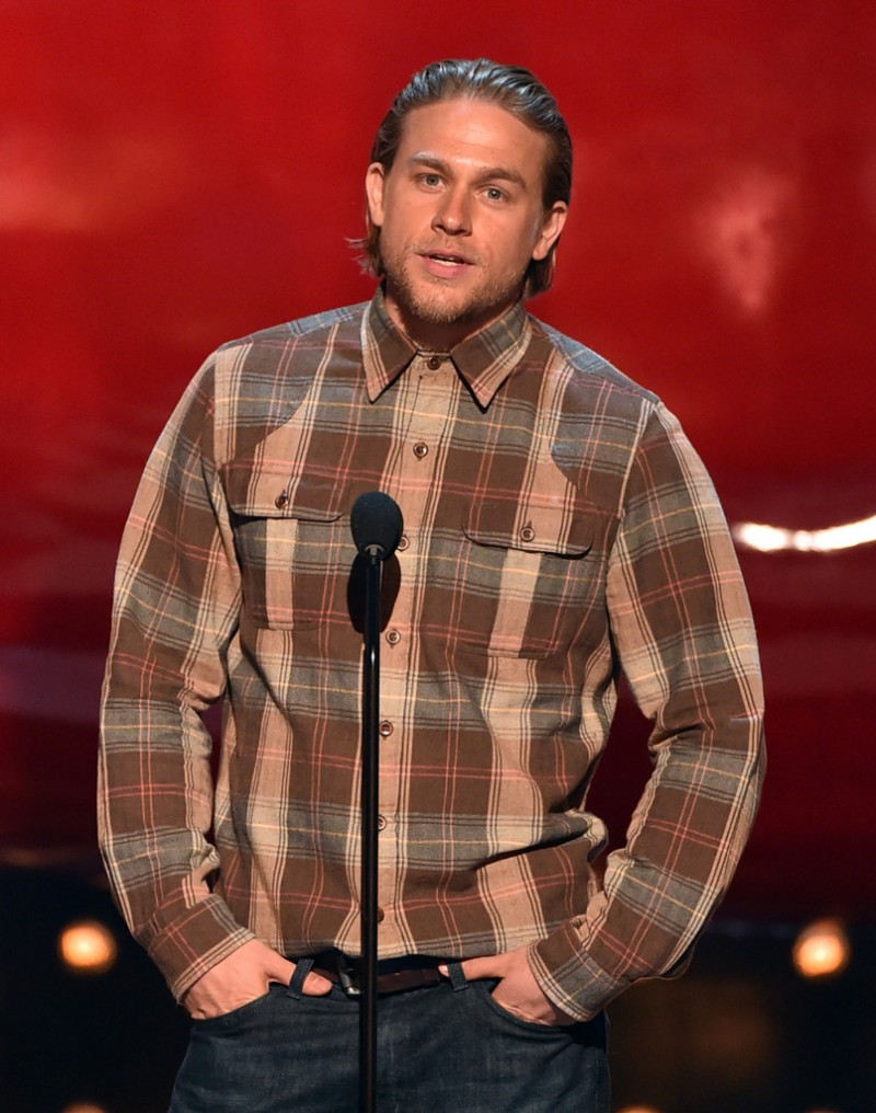 'Sons of Anarchy' star Charlie Hunnam didn't differ greatly fro his character in an oversized plaid shirt jacket.