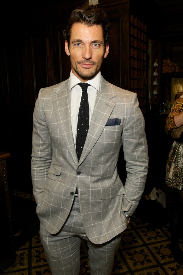 David Gandy wears Tommy Hilfiger windowpane suit to the designer's private fashion week dinner.