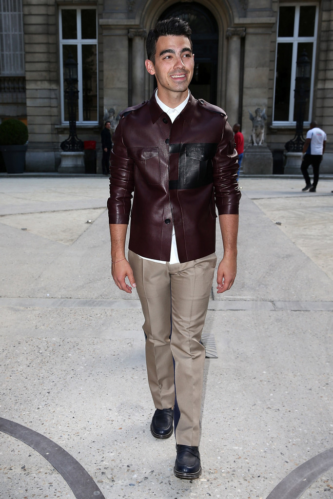 Joe Jonas played it bold in Valentino's signature leather wears, attending its spring/summer 2015 show in Paris.