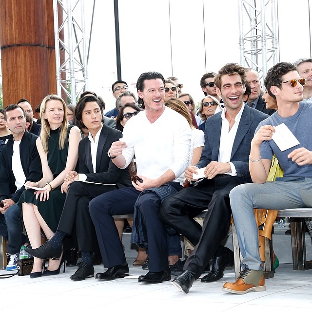 Actor Luke Evans and model Jon Kortajarena are all smiles front row at Louis Vuitton.