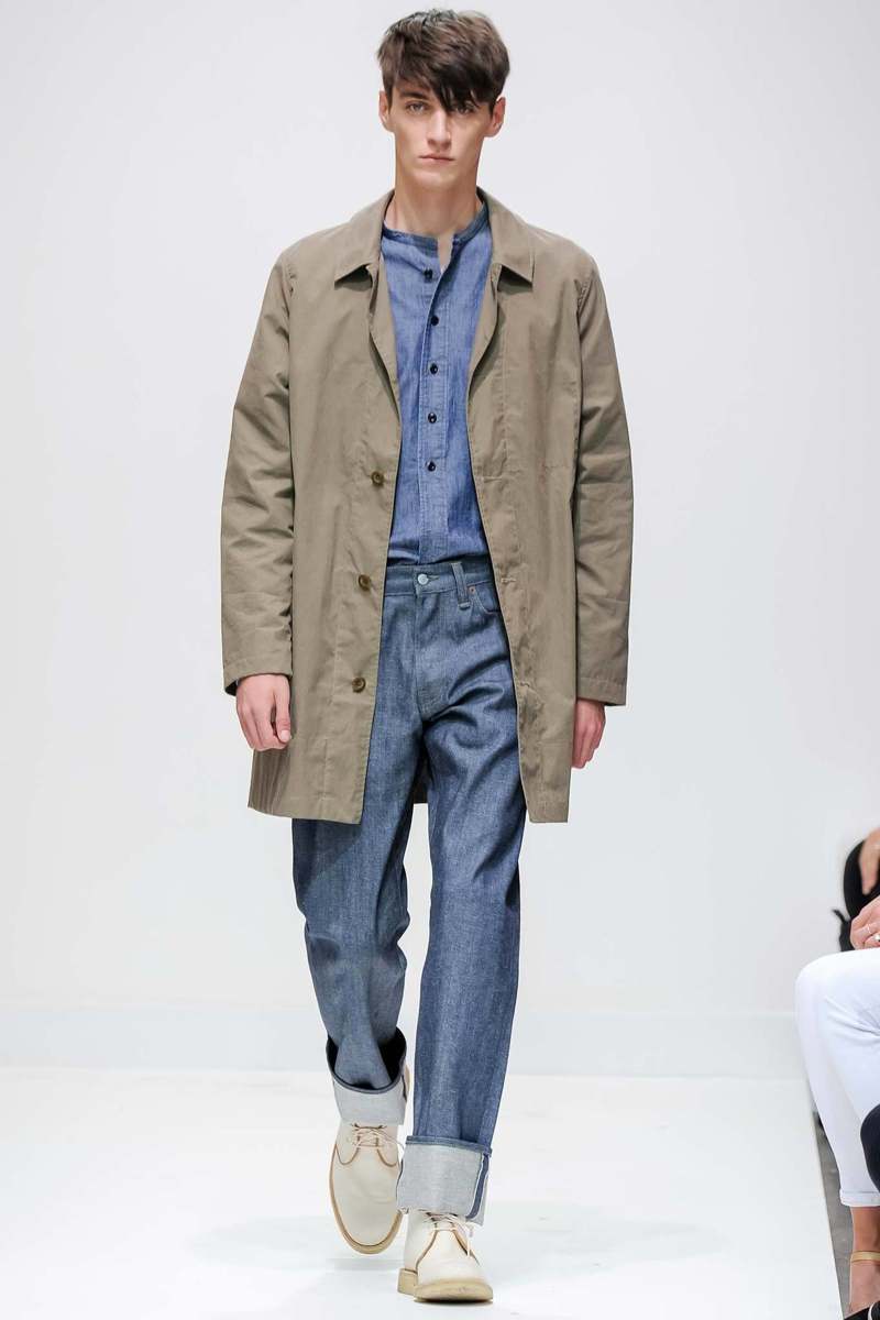 Margaret Howell Spring/Summer 2015: Known for its simplistic approach to menswear, Margaret Howell tackles the denim trend with a relaxed cut and elongated silhouette, ideal for cuffing. As shown by the styling, denim jeans go perfect with a chambray shirt.