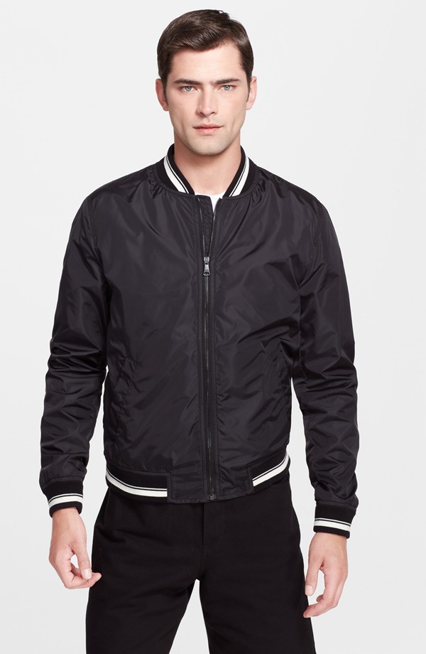 Sean O'Pry wears Dolce & Gabbana baseball jacket from Nordstrom