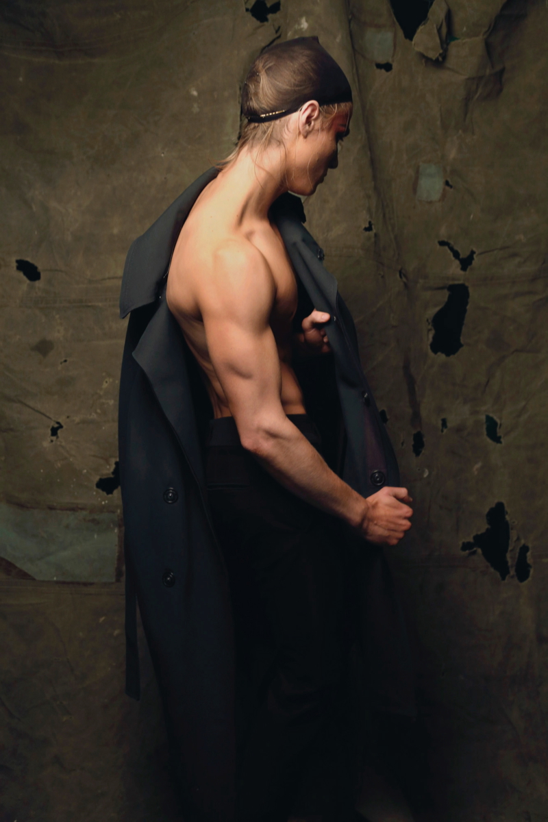 Dorian wears coat Lanvin and trousers Bottega Veneta.