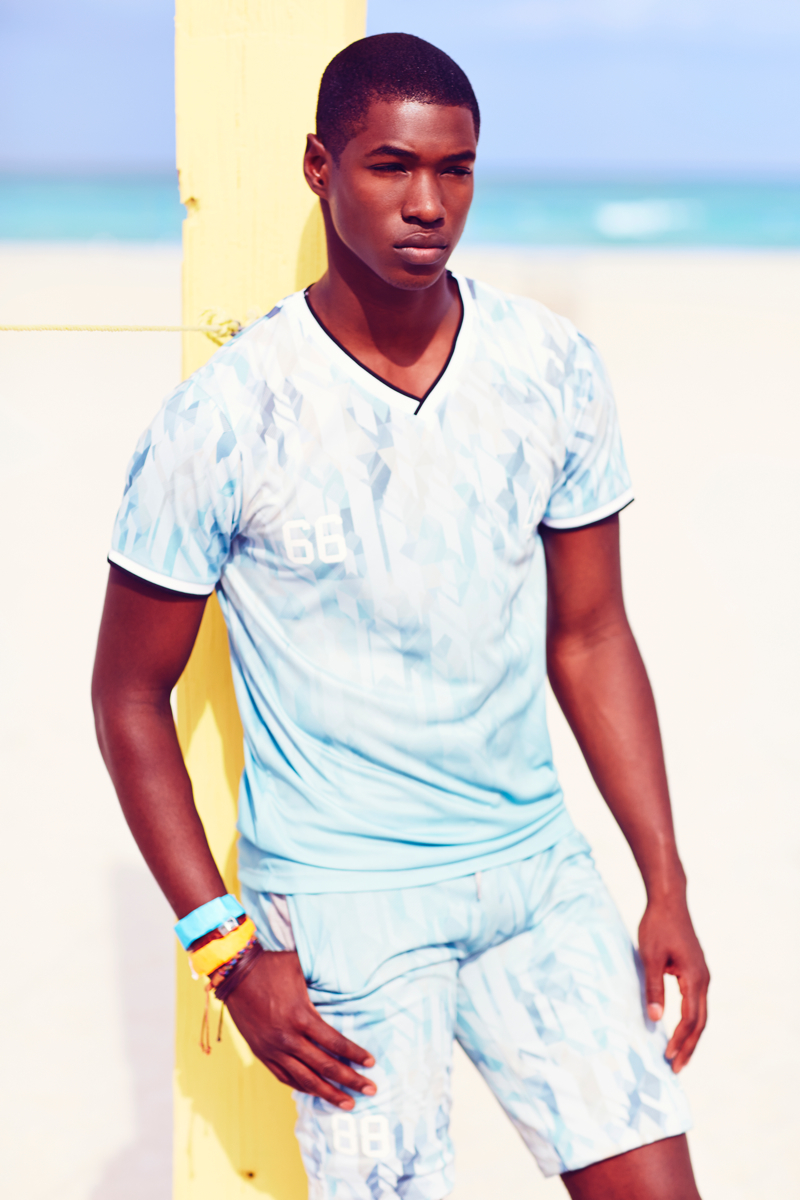 Model Ronald Epps wears a look from River Island's World Cup collection