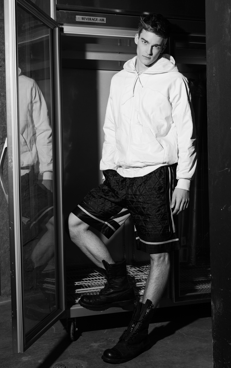 Thorben wears hooded leather pullover Martin Keehn and shorts Bobby Day.