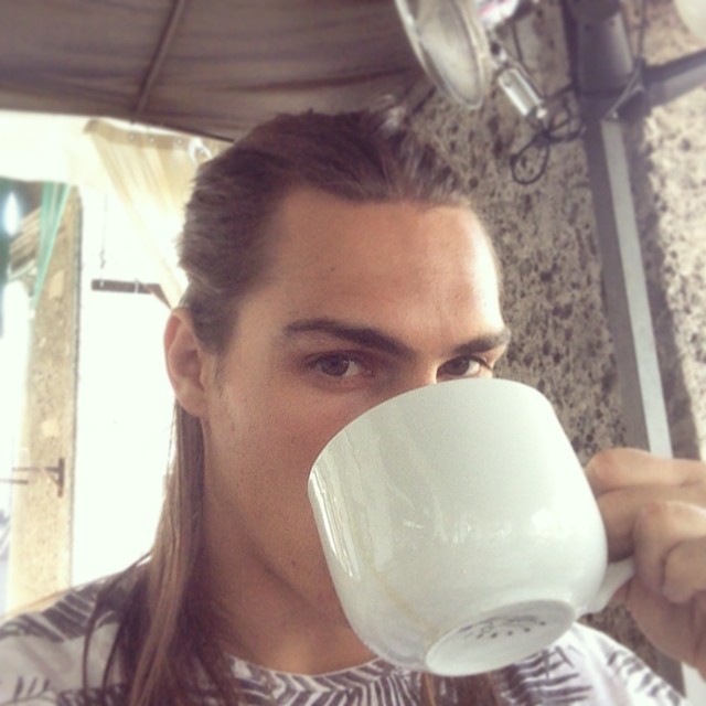 Travis Smith enjoys a morning cup of joe in Milan.