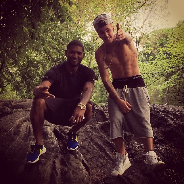 Sagging, Justin Bieber poses for a picture with Usher, showing off the waistband of his Calvin Klein underwear.