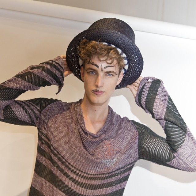 British model James Smith poses backstage at Vivienne Westwood's show.