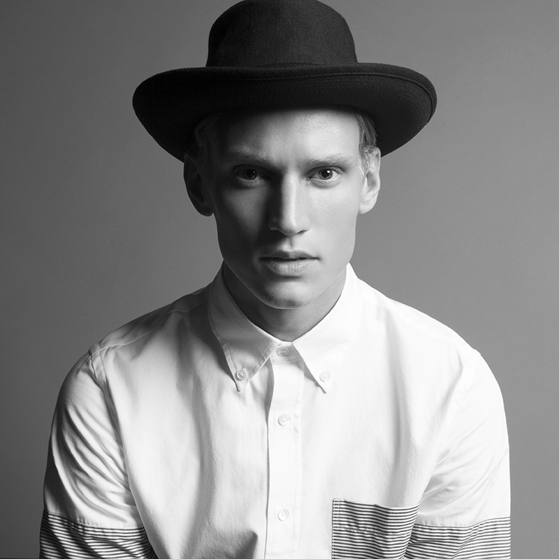 Alexander wears Shirt Timo Weiland and hat The Kooples.