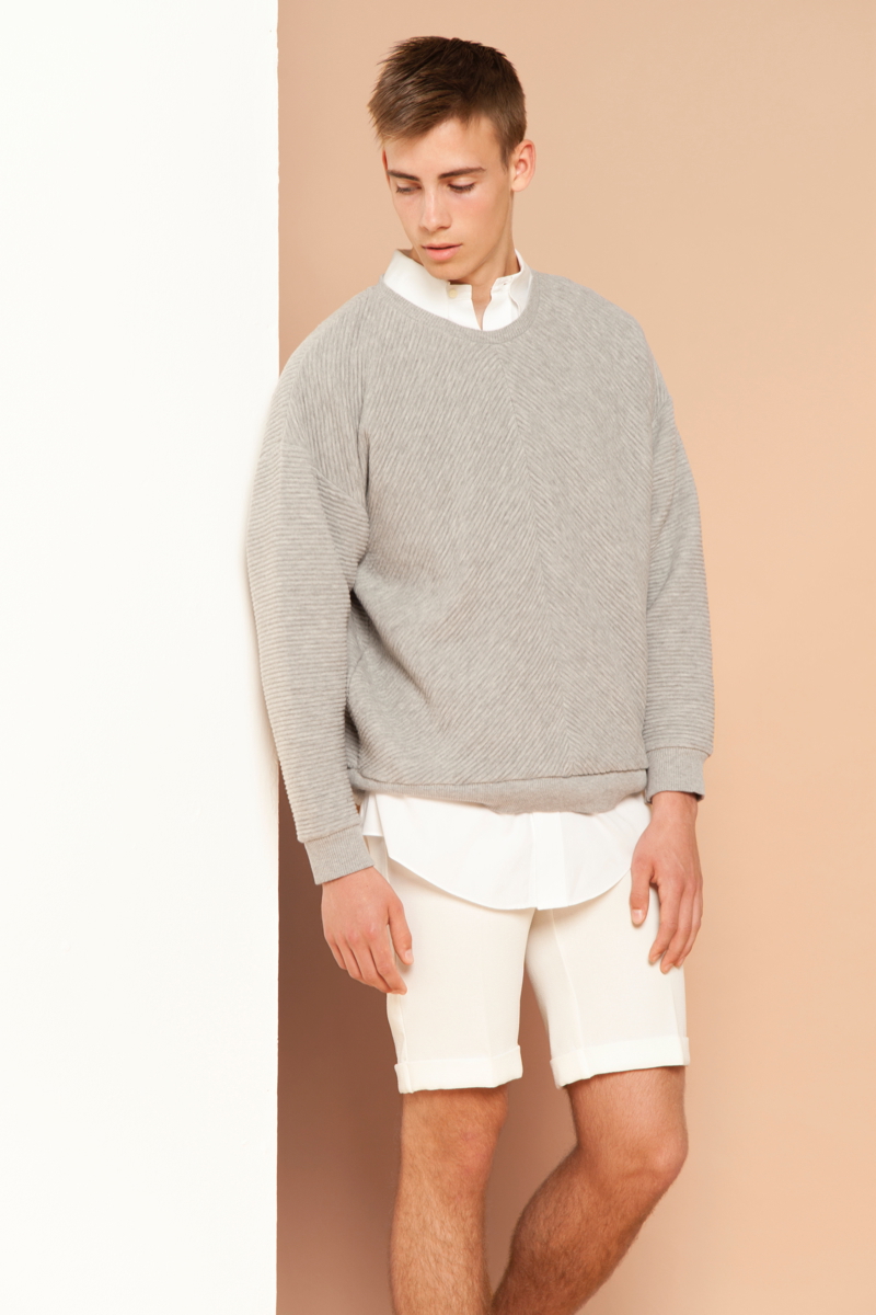 Connor wears shirt Ralph Lauren, sweater and shorts Topman.