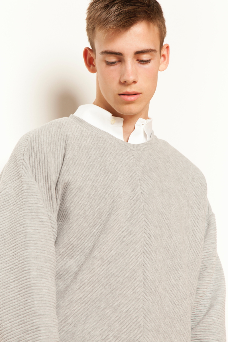 Connor wears shirt Ralph Lauren and sweater Topman.