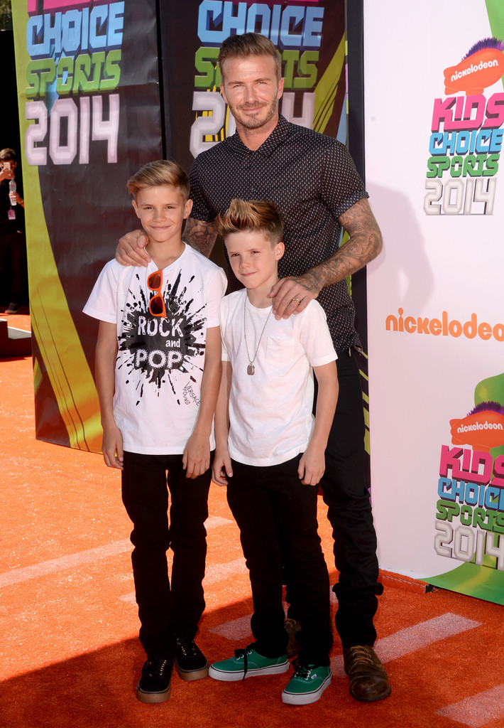 David Beckham poses for a photo with his sons Romeo and Cruz.