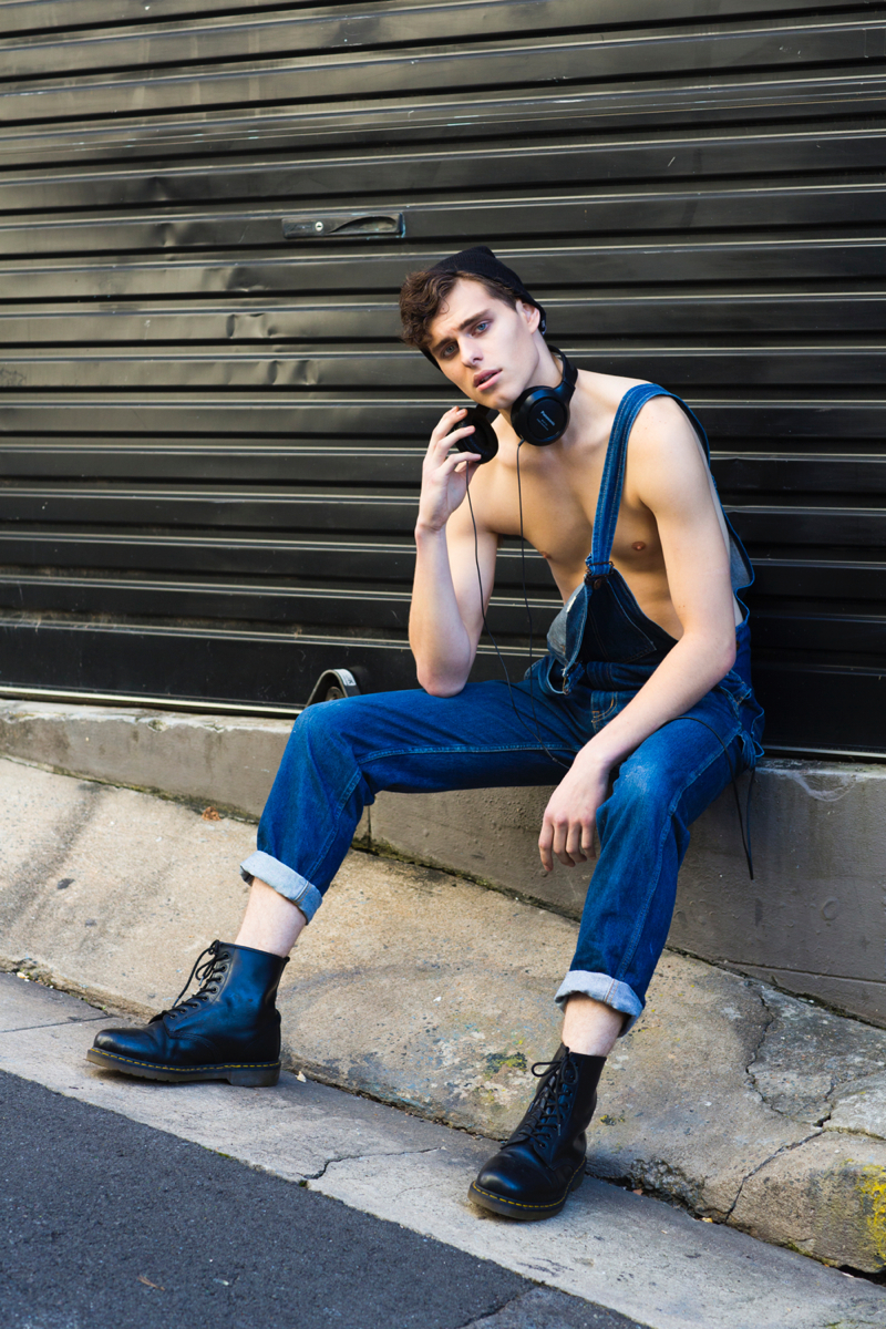 Ethan wears overalls Levi's, headphones Panasonic, boots Dr Martens and beanie model's own.