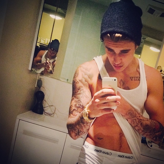 Justin Bieber poses for a selfie, revealing his Calvin Klein underwear.