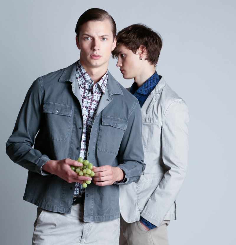 Left to Right: Linus wears shirt and belt Brioni, jacket and shorts Dondup. Vladimir wears shirt Brioni, jacket Dirk Bikkembergs and pants Dondup. 