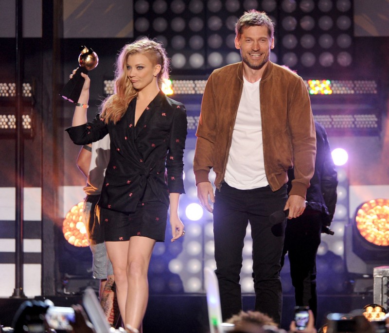 Nikolaj Coster-Waldau and 'Game of Thrones' co-star Natalie Dormer accept an award at MTVu Fandom Awards at Comic-Con. Coster-Waldau wears a suede varsity jacket from Todd Snyder.