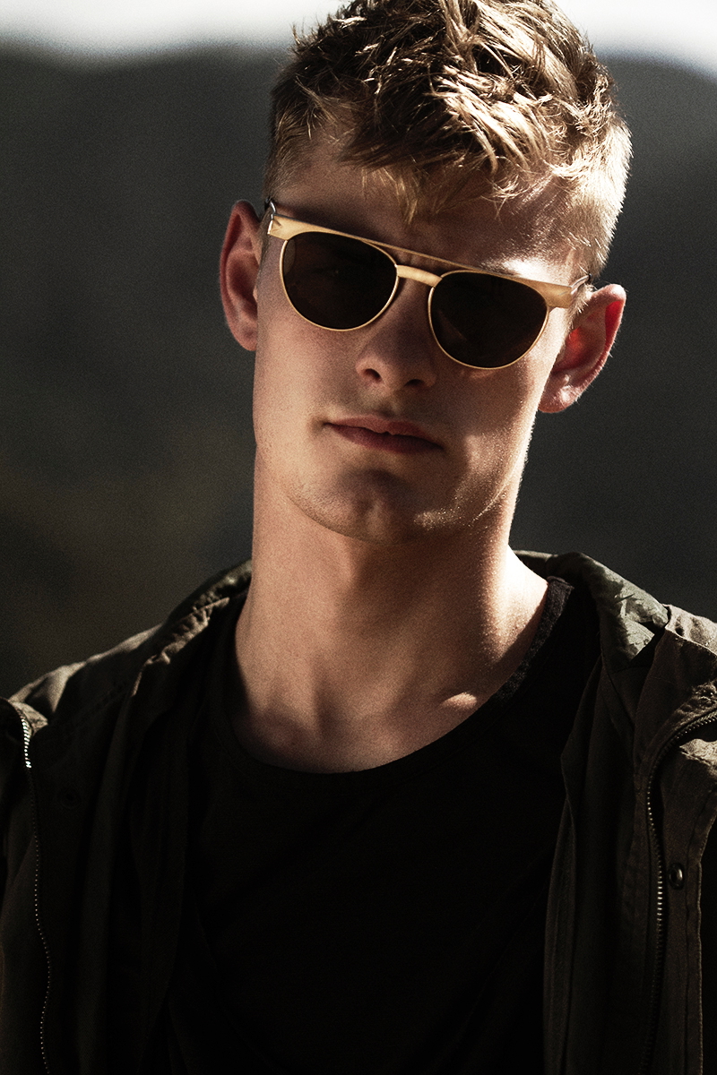 Noah wears jacket Nixon, t-shirt Zara and sunglasses Icon Eyewear from Nordstrom.