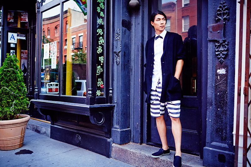 Sejin wears shirt Zanerobe, shoes Zuriick, vintage necktie stylist's own, blazer and shorts Chapter.