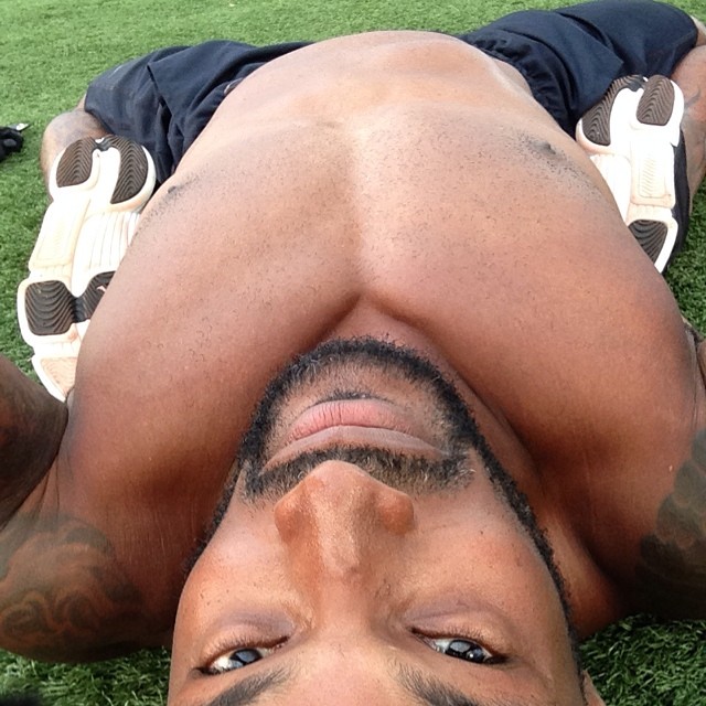 Tyson Beckford stretches for the ultimate workout.
