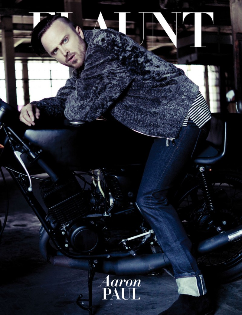 Aaron Paul wears shearling bomber Ermenegildo Zegna Couture, striped long sleeve cotton s-shirt Lanvin, rebel straight denim jeans Cult of Individuality, leather boots Roberto Cavalli and leather belt Emporio Armani.